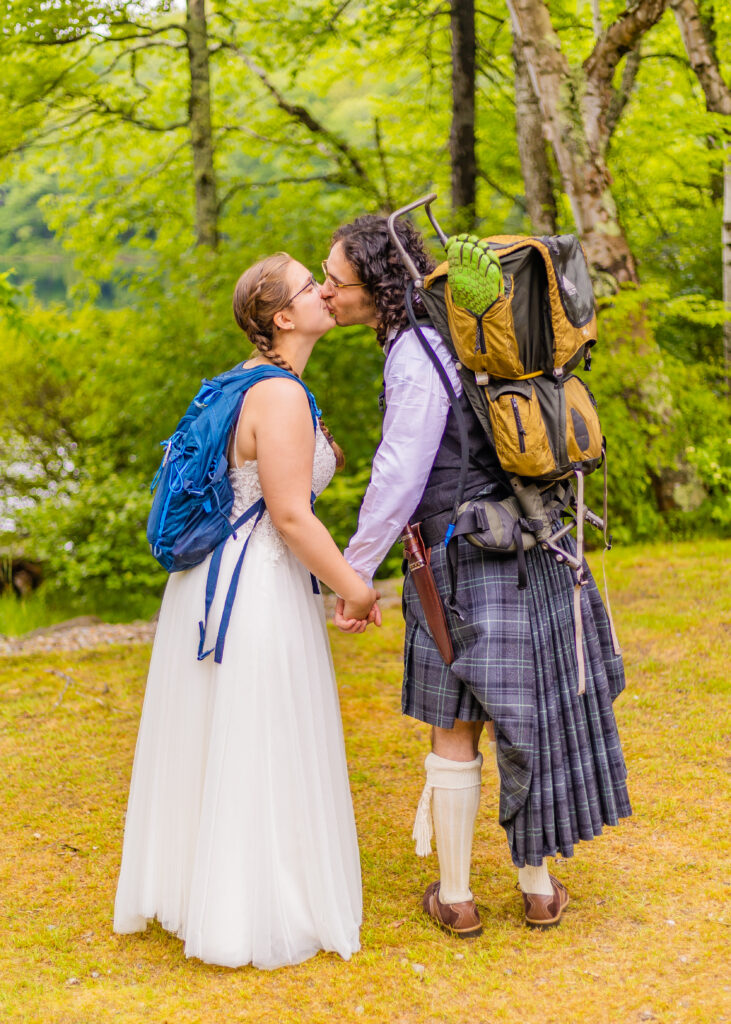 A couple shares a kiss at their elopement in the White Mountains of New Hampshire.