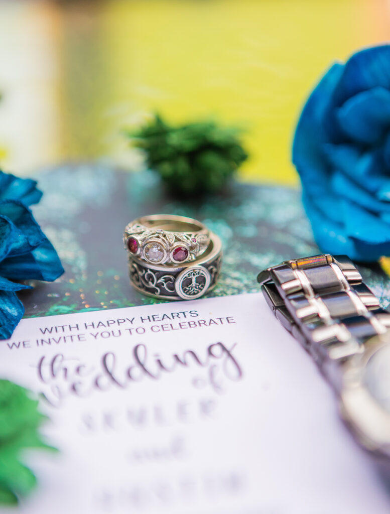 bride and grooms wedding rings at their intimate summer wedding in NH