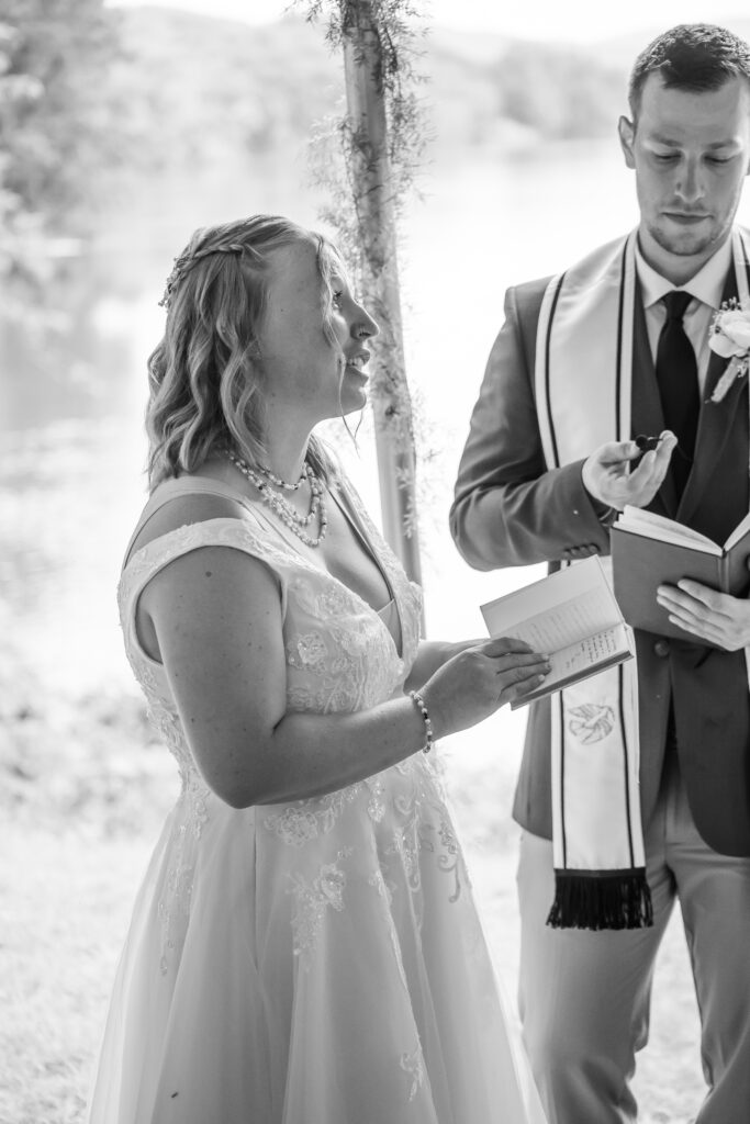 The bride reads her vows to her future husband.
