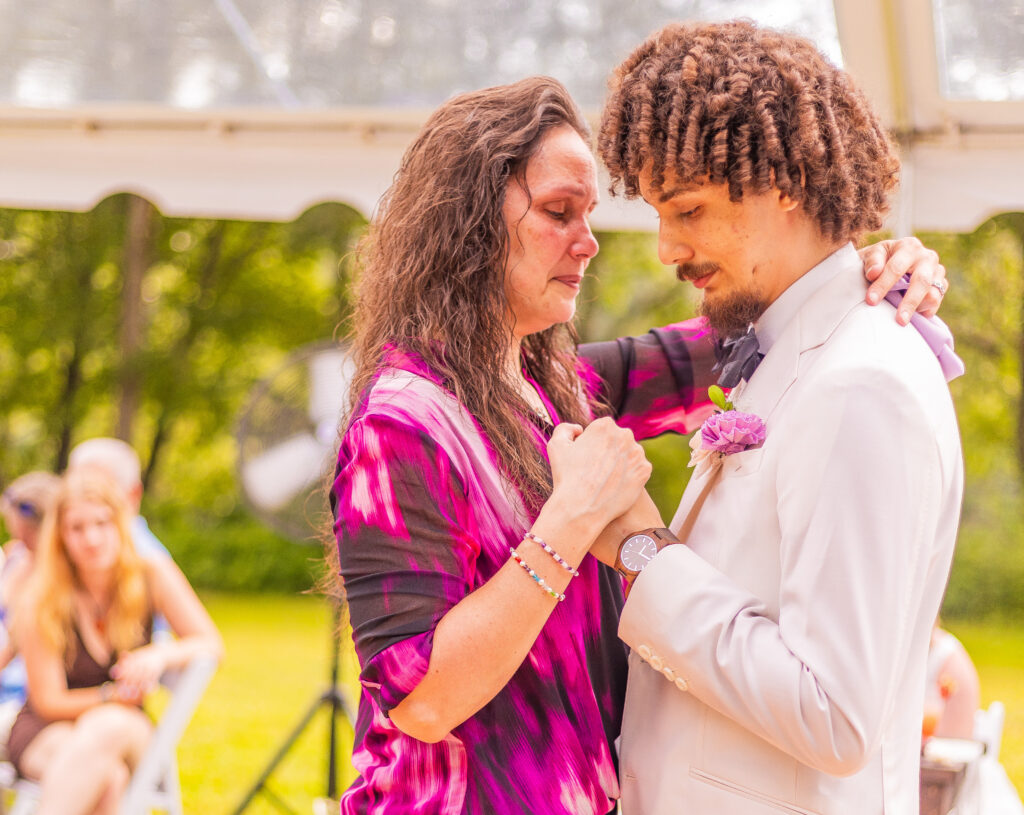 Mother gets emotional while dancing with her son at his wedding.