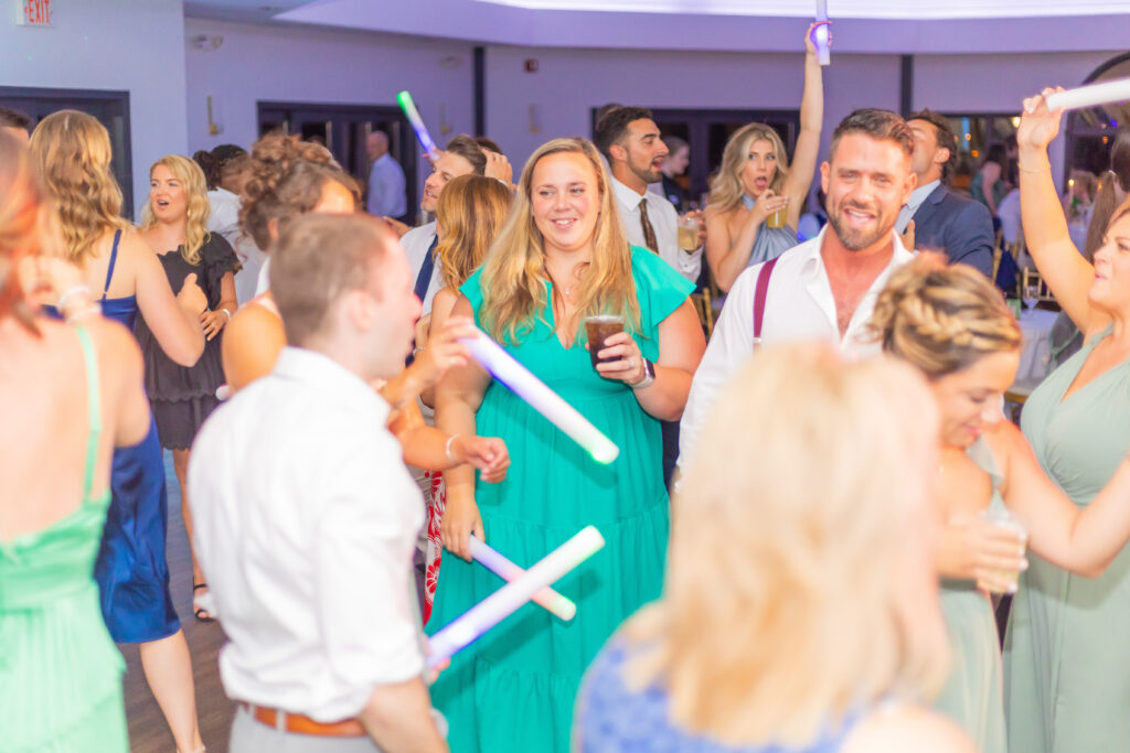 Wedding guests dancing to music from A Main Event Wedding DJs.