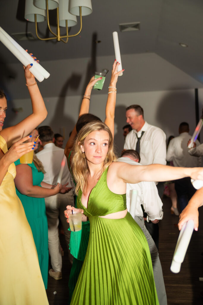 Wedding guest busting a move at a wedding near Boston, MA.