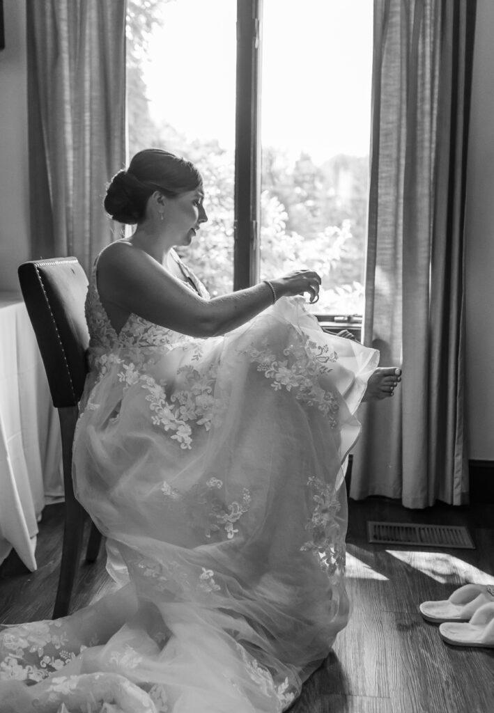 Bride getting ready in the bridal suite at the Granite Rose in Hampstead, NH.