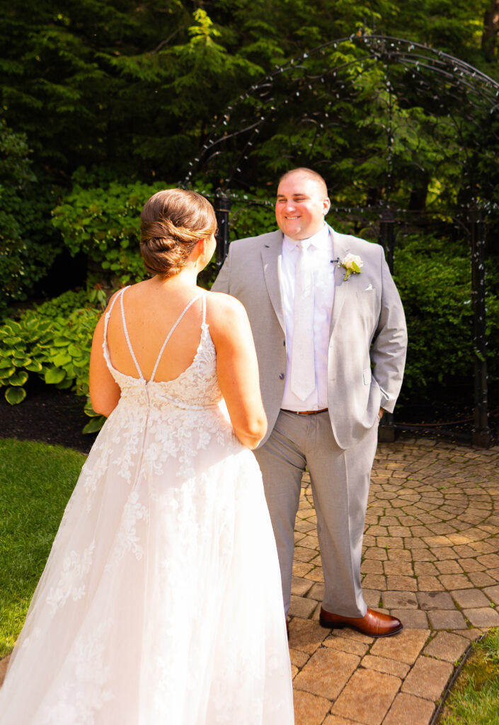 Bride and groom sharing a first look.