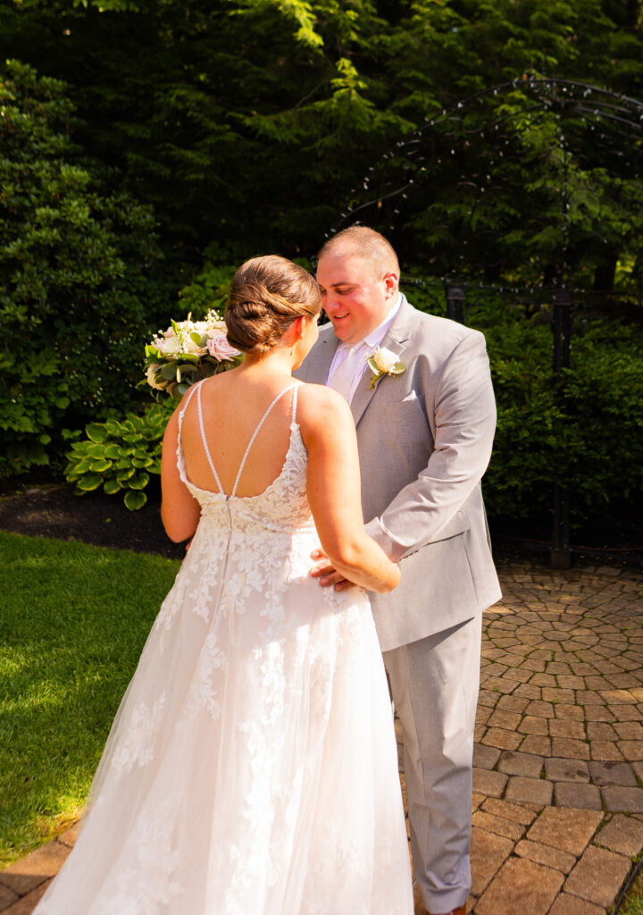 Groom admires his bride.