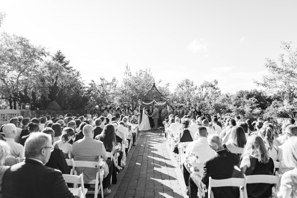 Wedding ceremony in the gardens at the Granite Rose in Hampstead.