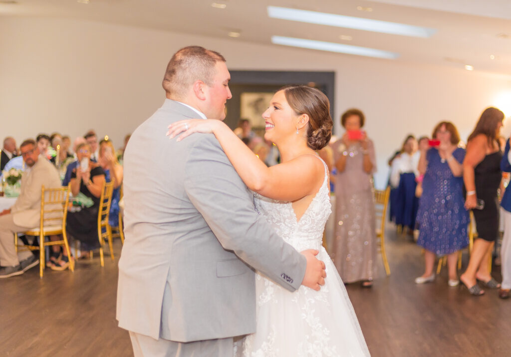 Bride and groom sharing a first dance.