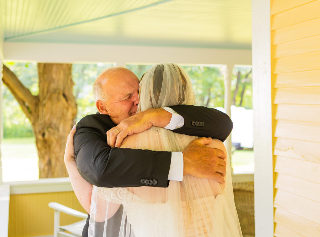 Dad sharing a first look with his daughter on her wedding day.