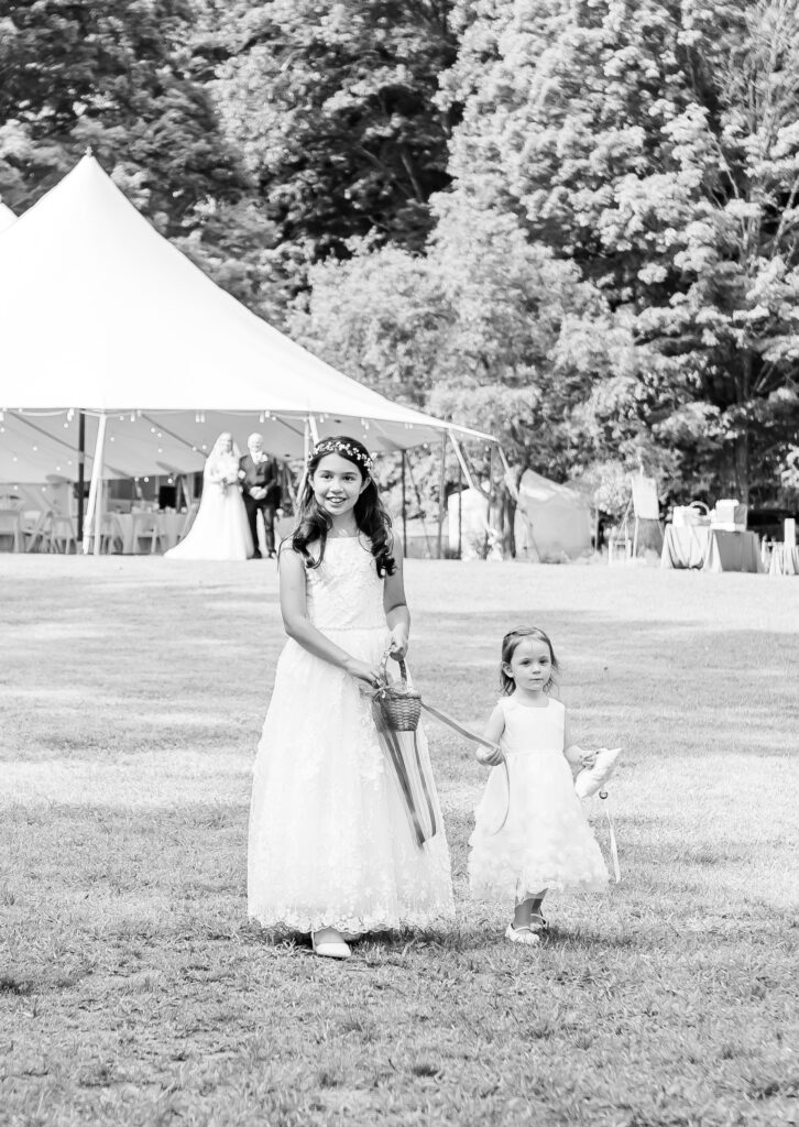 flower girls walking down the aisle