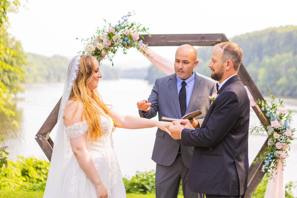 Bride and groom exchange rings.