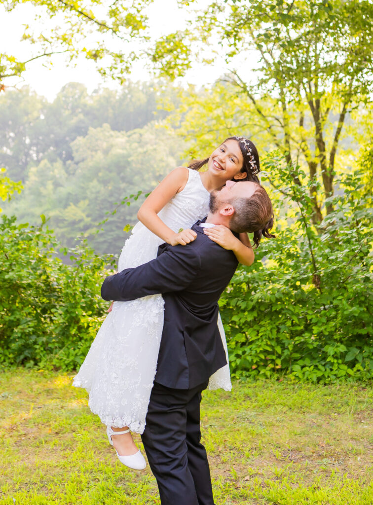 Groom and his daughter on his wedding day.