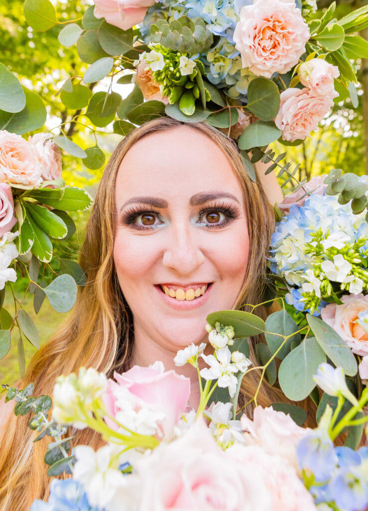 Flowers surrounding the brides face.