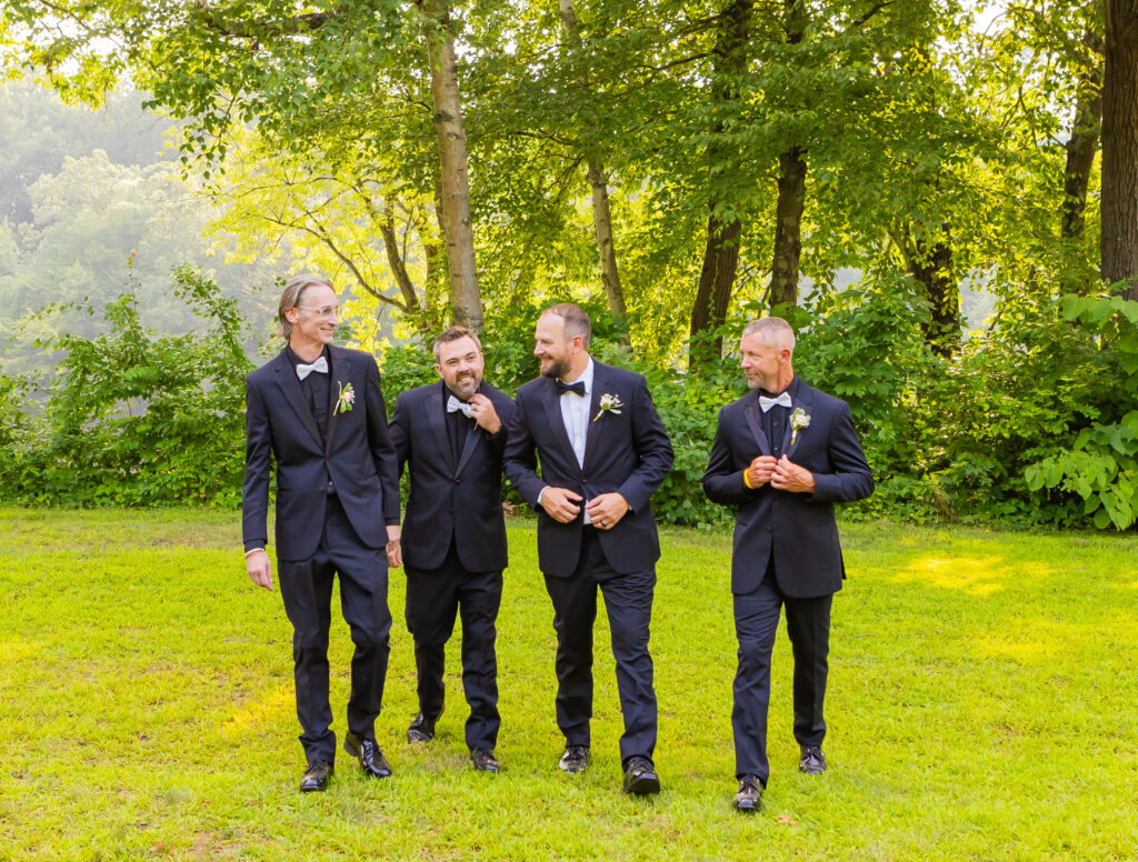 Groom and his groomsmen walking together.