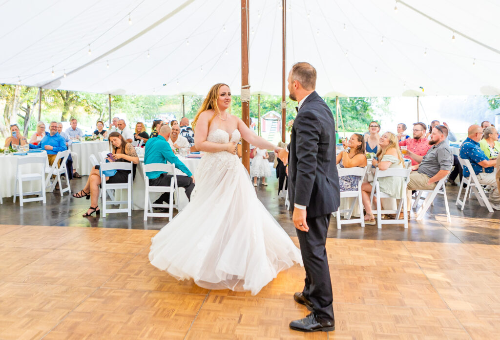 Bride spins during their first dance at Stone Garden in NH.