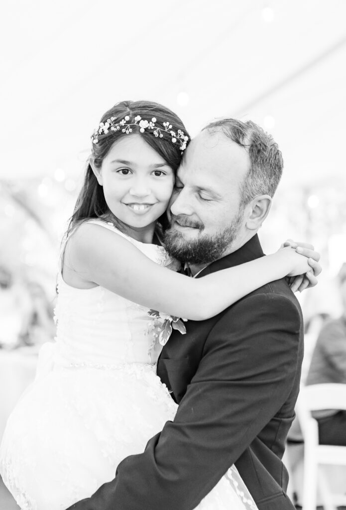 Groom and daughter share a dance at their tented wedding in NH. 