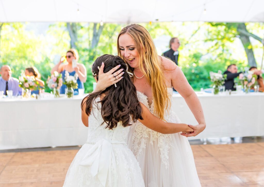 Bride and daughter sharing a dance.