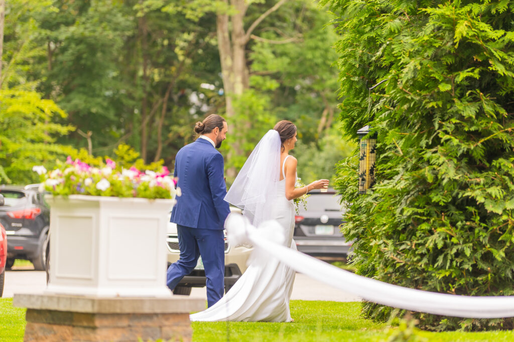 Bride and groom step away after their ceremony.