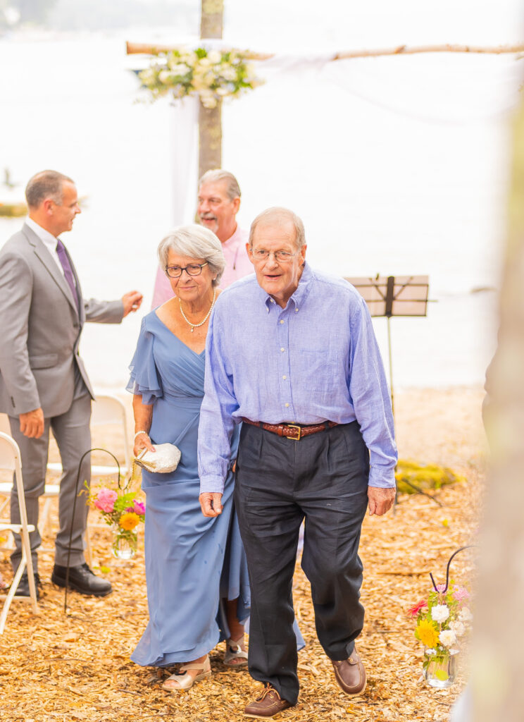 Grandparents walking together hand in hand.