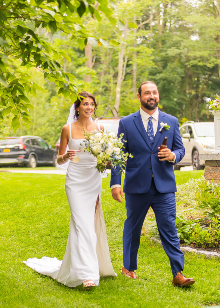 Bride and groom see all their friends and family after the wedding ceremony in Wolfeboro, NH.