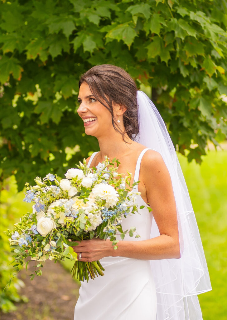 The bride candidly laughing.