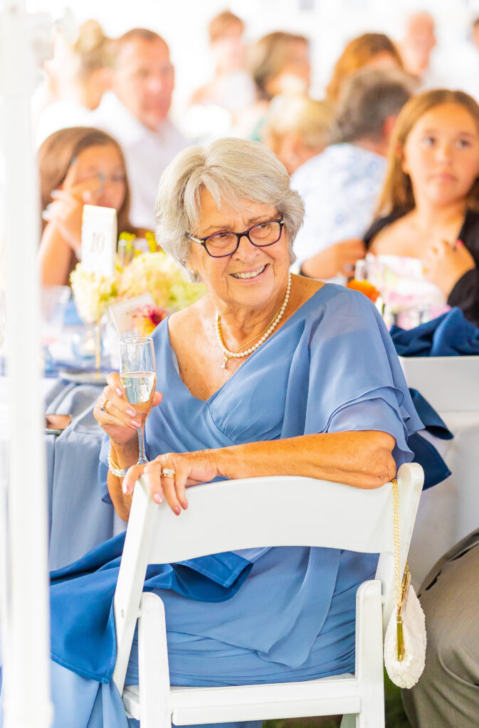 Grandmother of the bride toasting at this NH wedding.