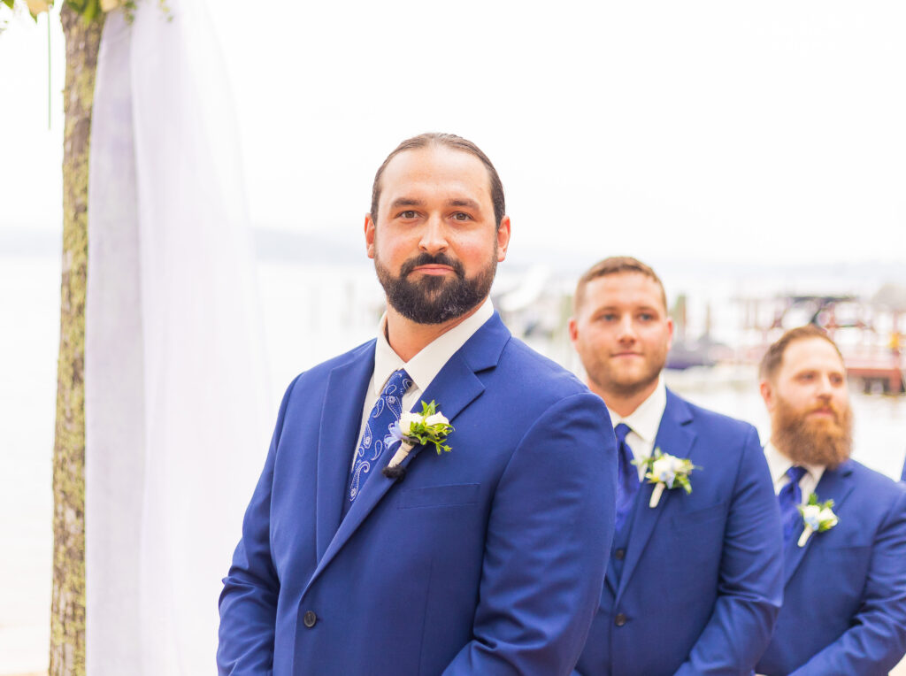 Groom is waiting for his bride to emerge.