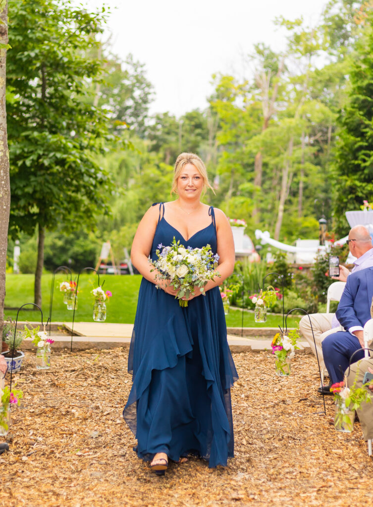 Bridesmaid in a birdy grey bridesmaid dress