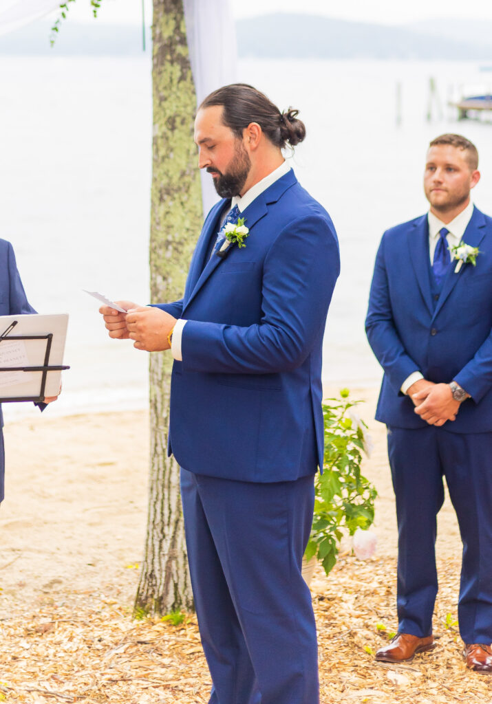 The groom reads his vows.