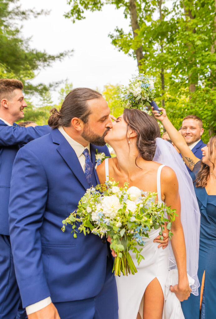 Bride and groom sharing a kiss.