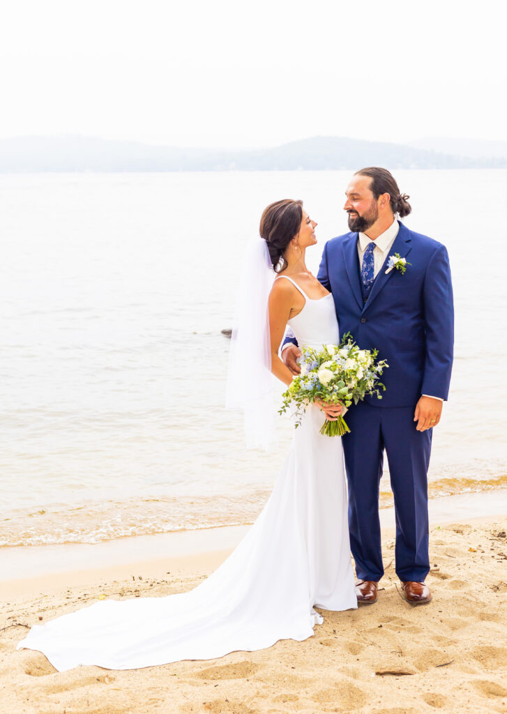 Bride and groom at their wedding on an overcast day.