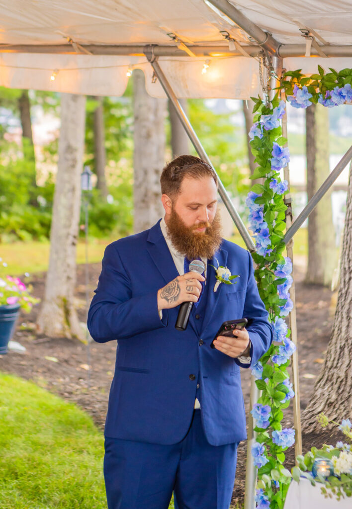 Groomsmen gives a speech.