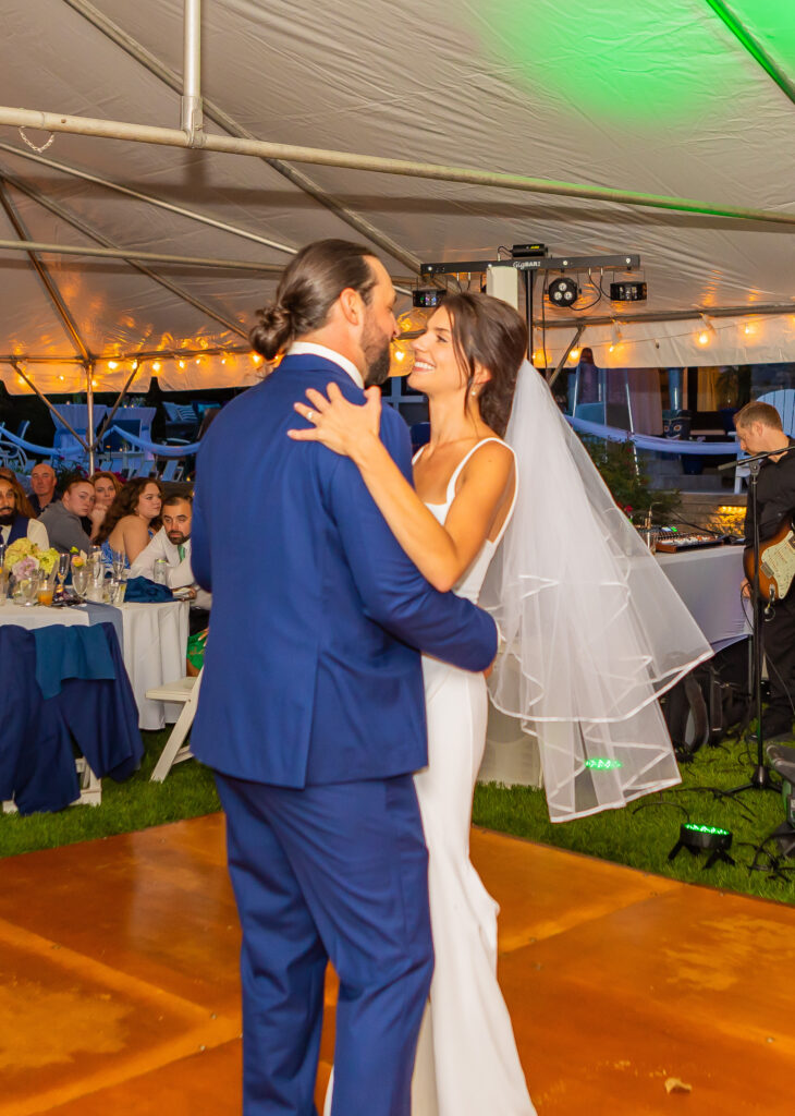 Bride and groom sharing their first dance at their Lake Winnipesaukee Wedding.