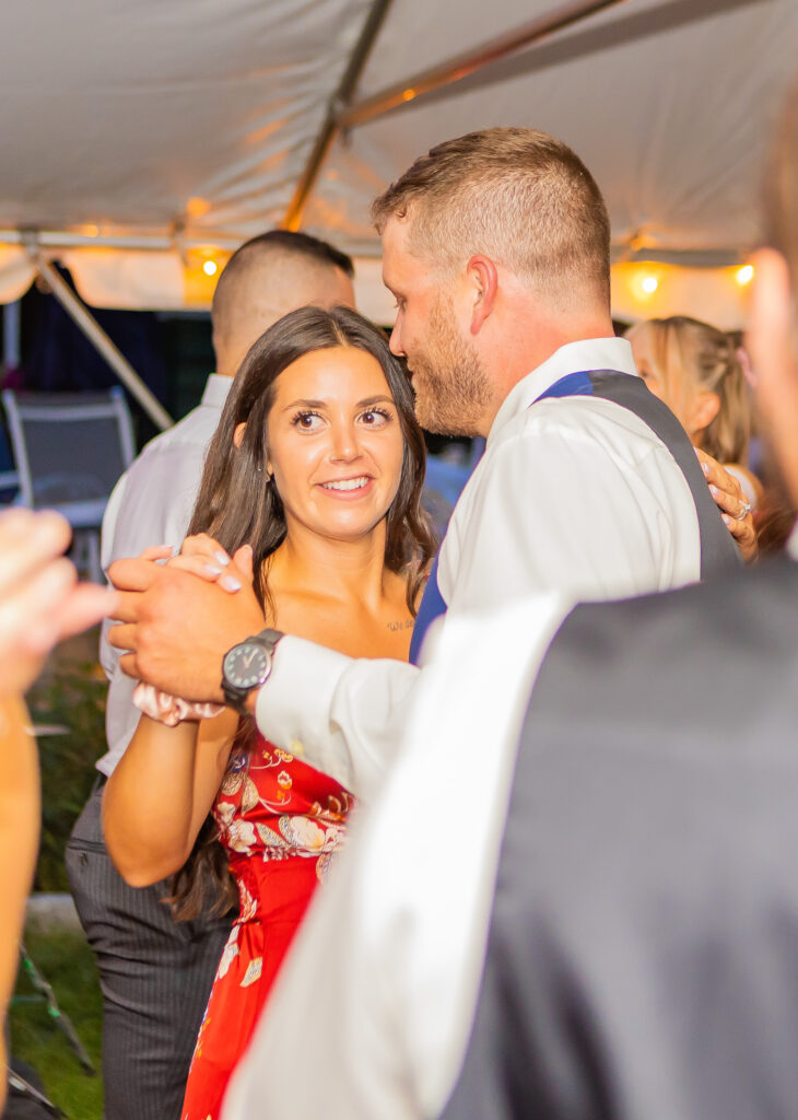 Guests sharing a dance.