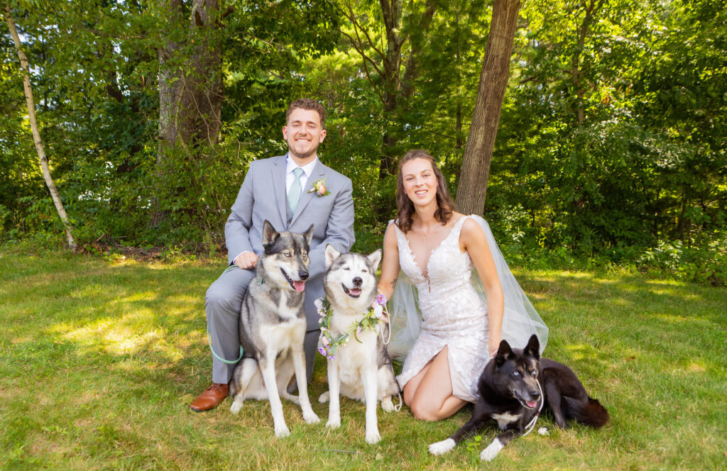 Bride and groom with their dogs at a Nh Hampton Beach Elopement