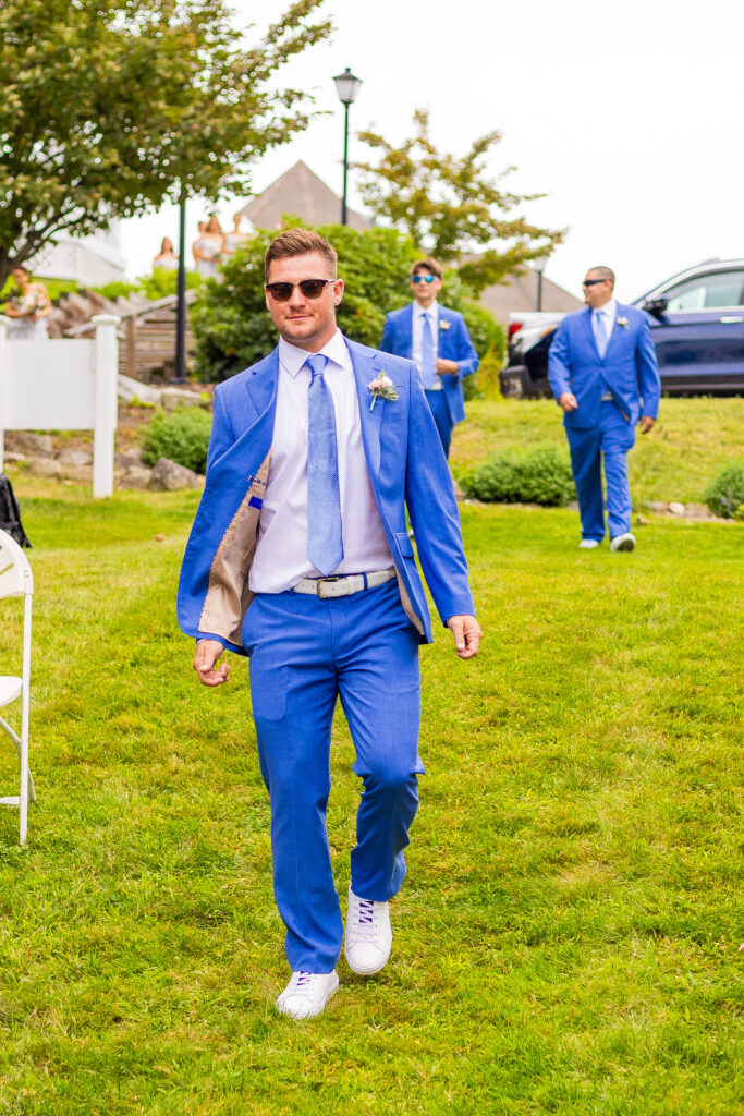 groomsmen walking down the aisle 