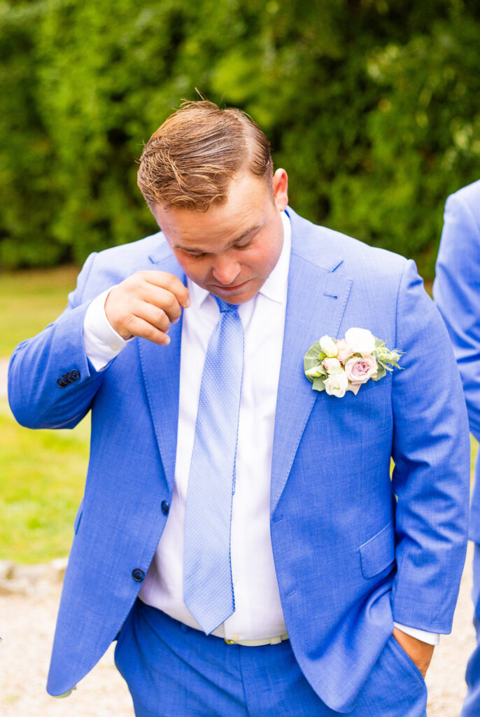groom wipes tears
