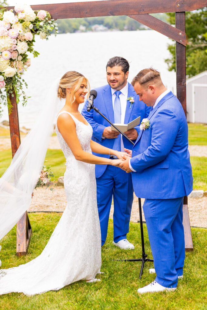 bride and groom join hands