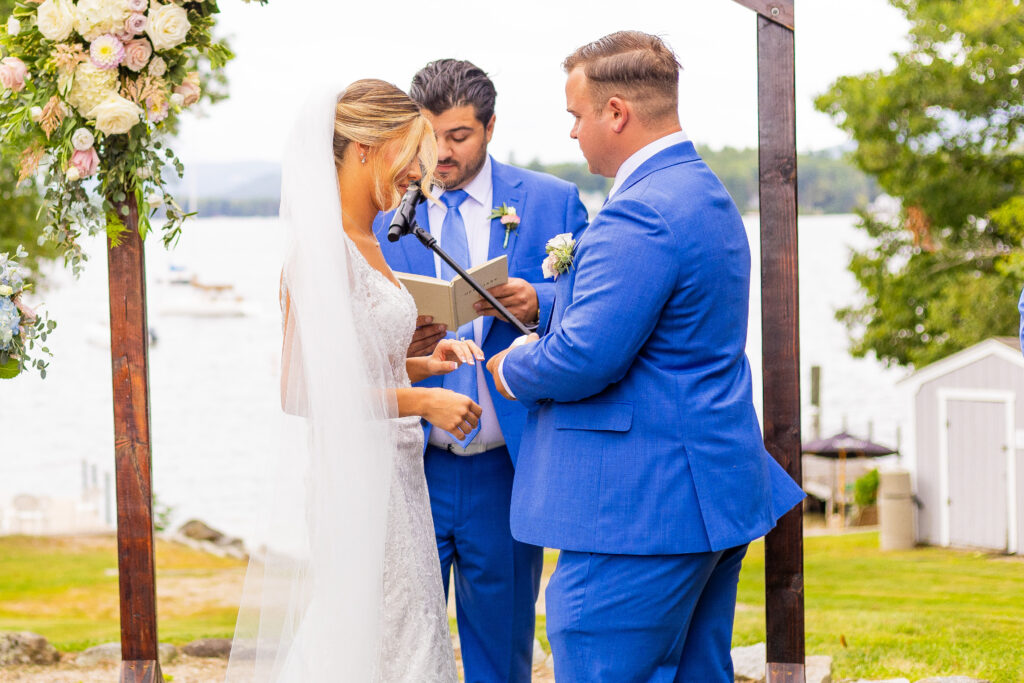 Bride and groom exchanging rings