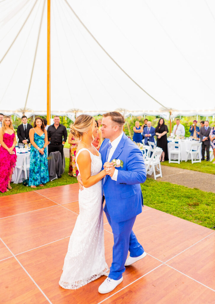 bride and groom dancing in a wedding tent at a breathtaking wedding venue in the lakes region