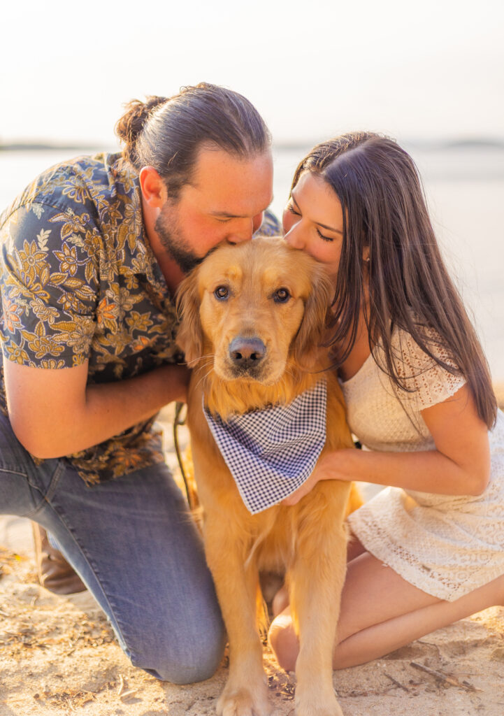 Engagement session with a dog overlooking Lake Winnipesaukee.
