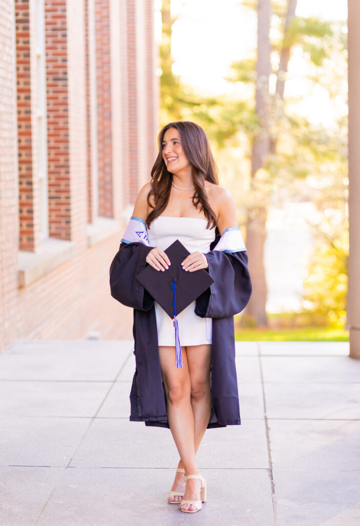 UNH graduation photos in front of the library in Durham, New Hampshire.